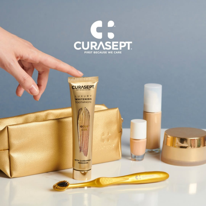Зубна паста CURASEPT LUXURY WHITENING GOLD, відбілююча, 75 мл + зубна щітка, косметичка